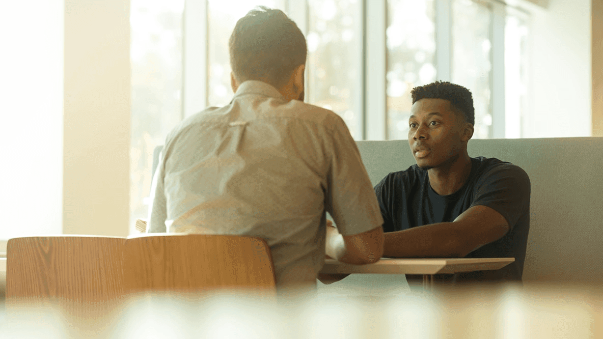 Two people in a recruitment interview session